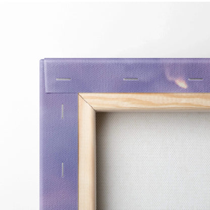 Close-up of wooden frame and purple fabric canvas corner for vertical wall art print.