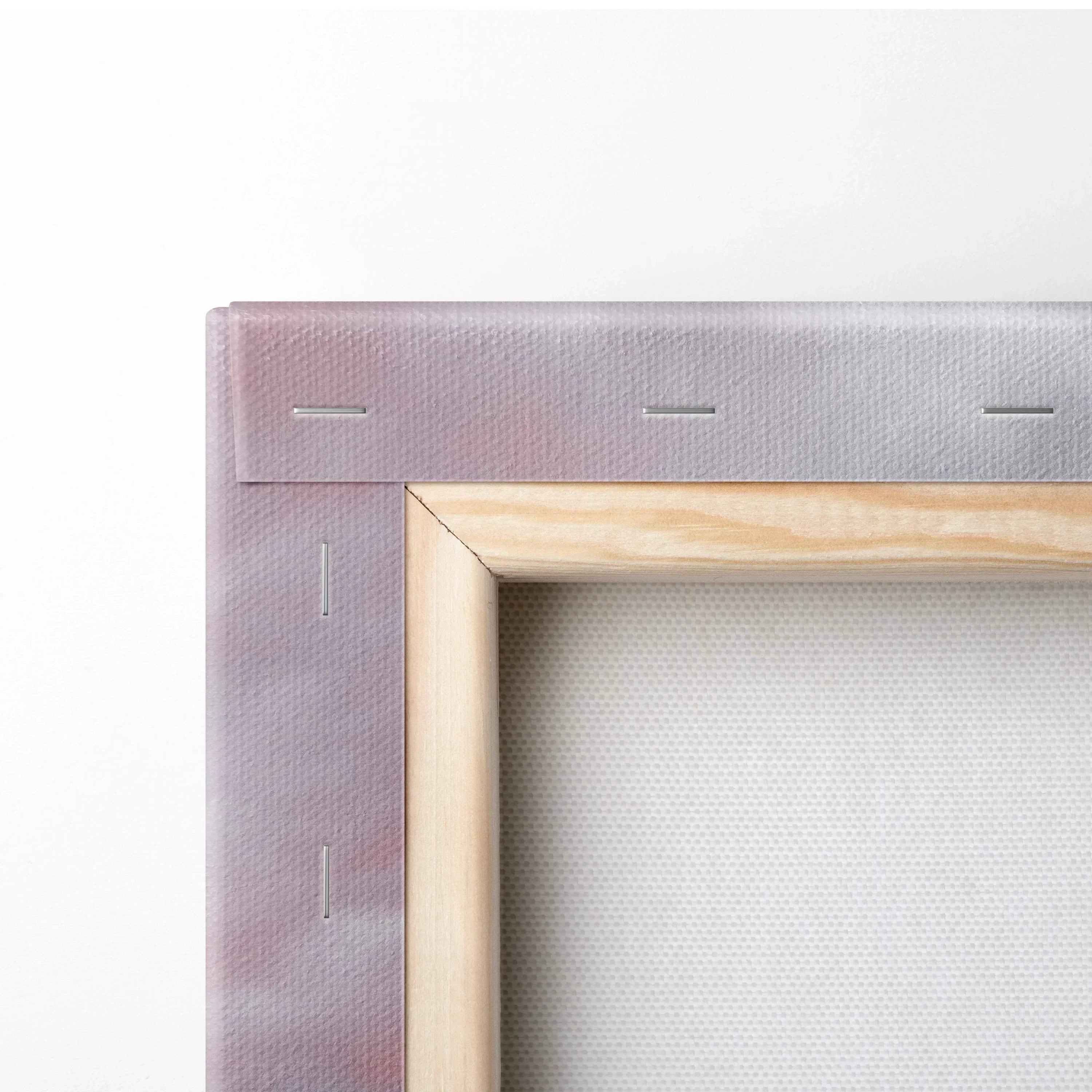Close-up of wooden frame and stretched white canvas for vertical wall art print.