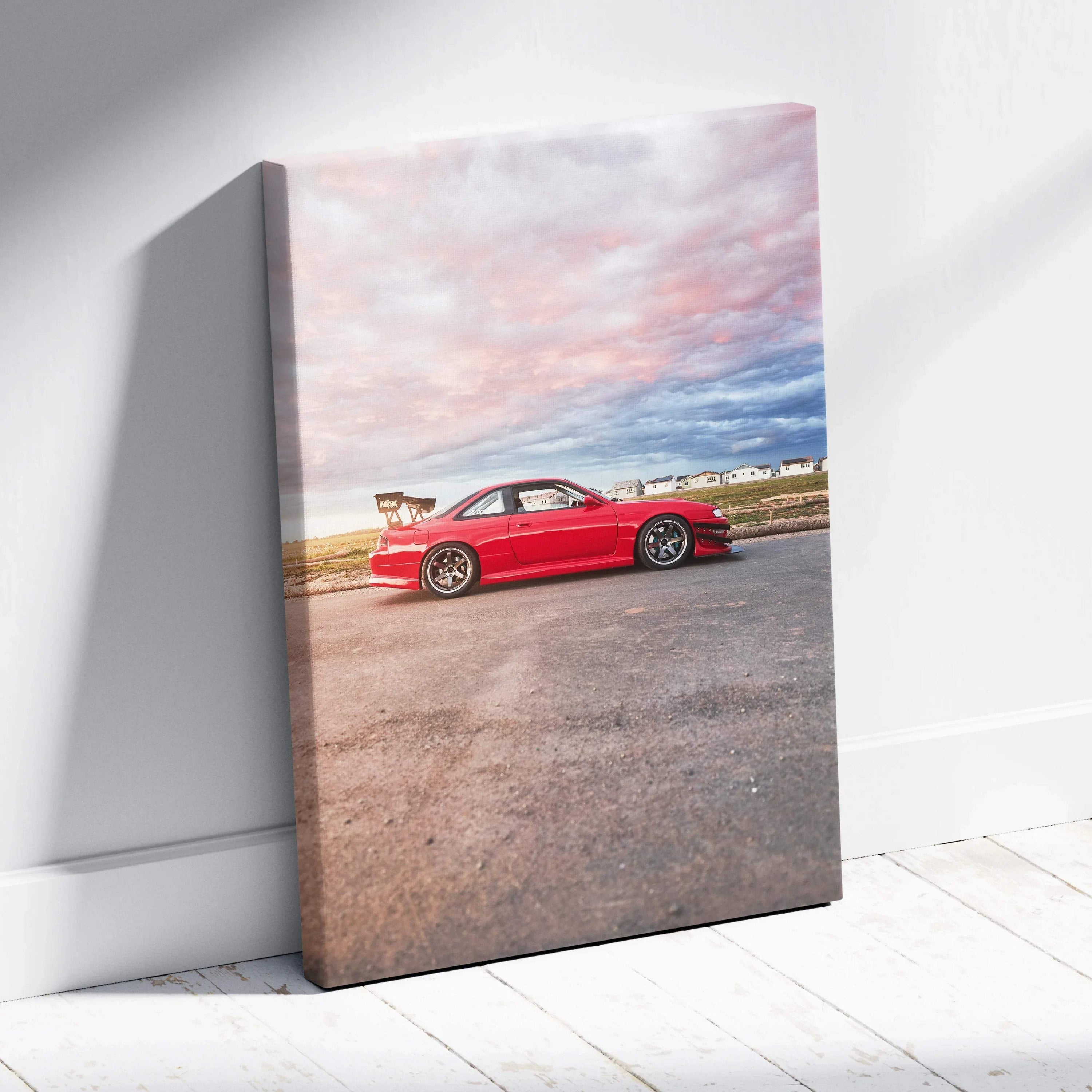 Red Nissan 240sx S14 Kouki on asphalt with dramatic pink and purple sky canvas wall art.