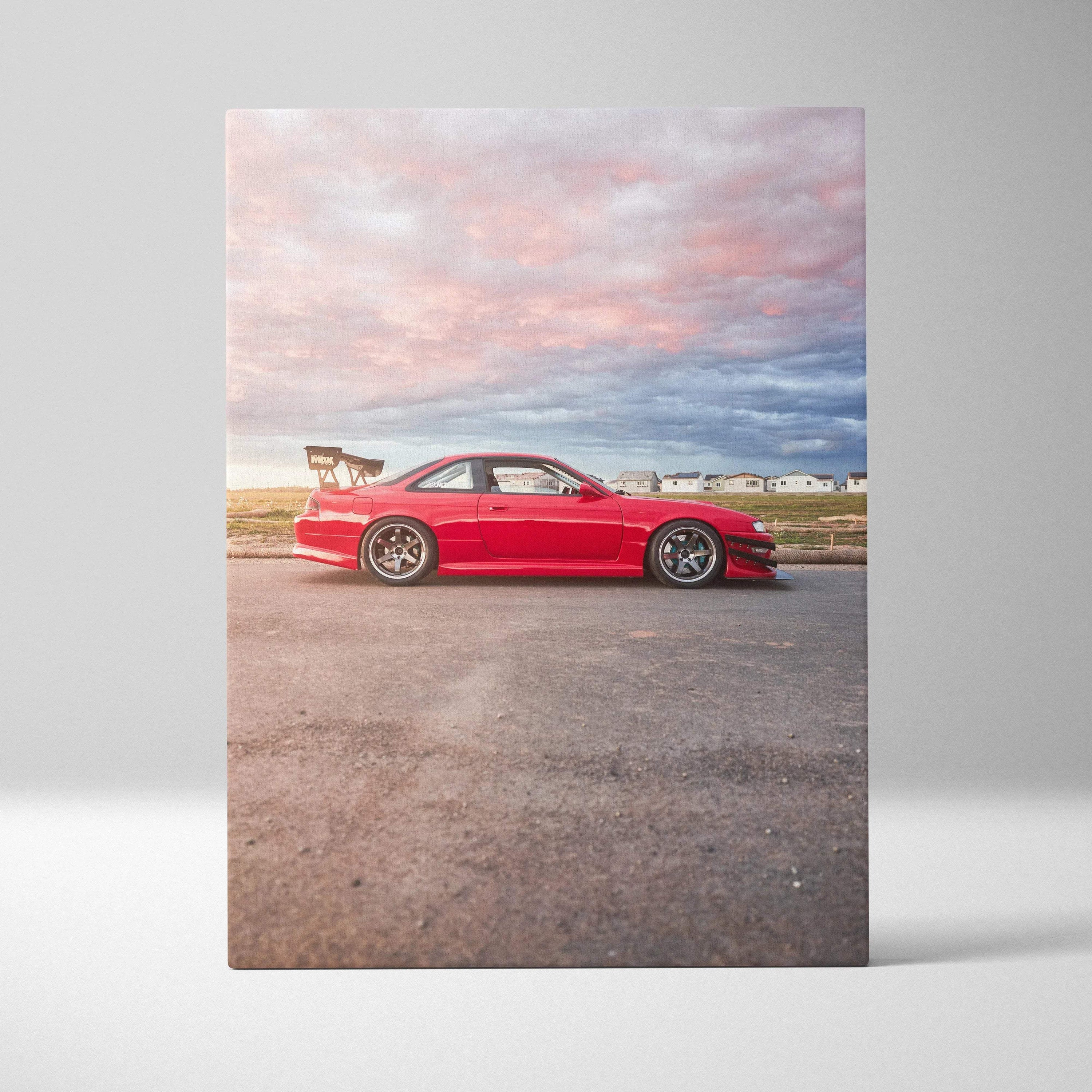 Red Nissan 240sx S14 Kouki sports car on canvas wall art with vivid sky background.