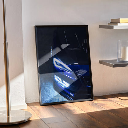 Subaru WRX close-up headlight poster with blue accents in black frame wall art.