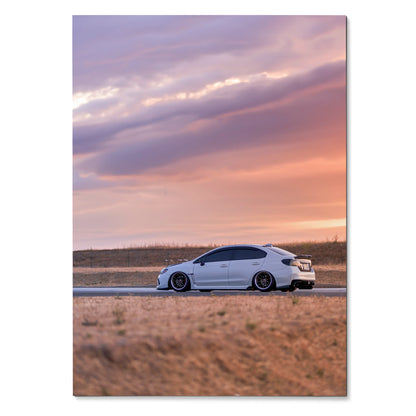 Subaru WRX white car on road at sunset with purple orange sky poster wall art.