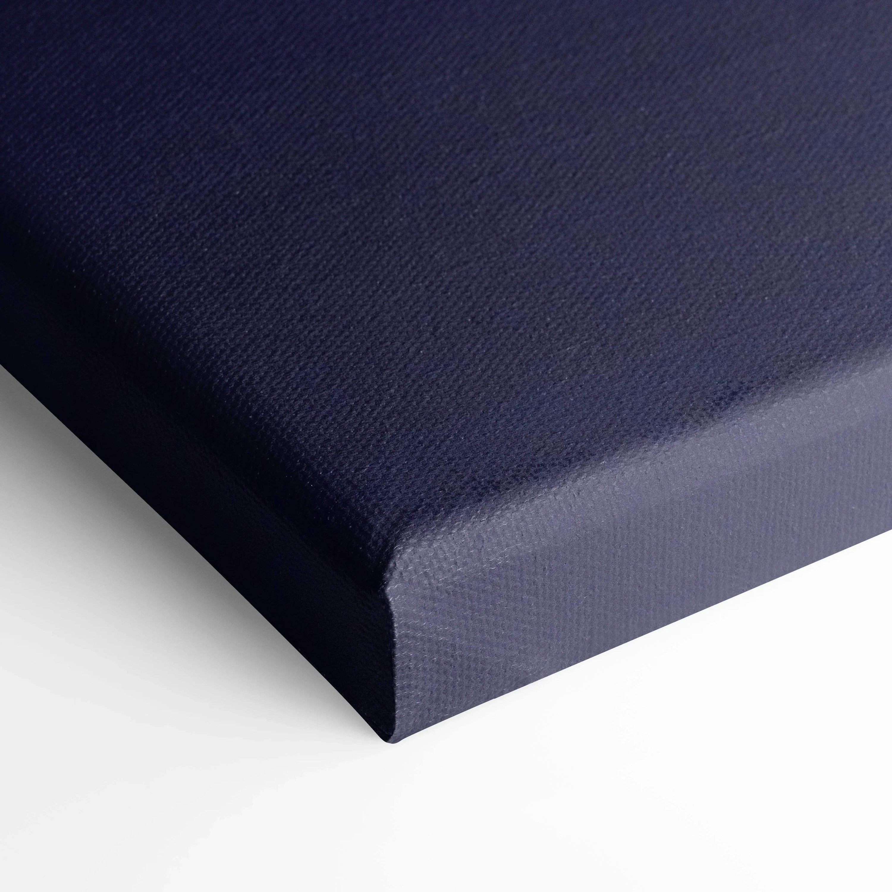 Dark blue textured canvas wrap corner detail of vertical wall art canvas print.