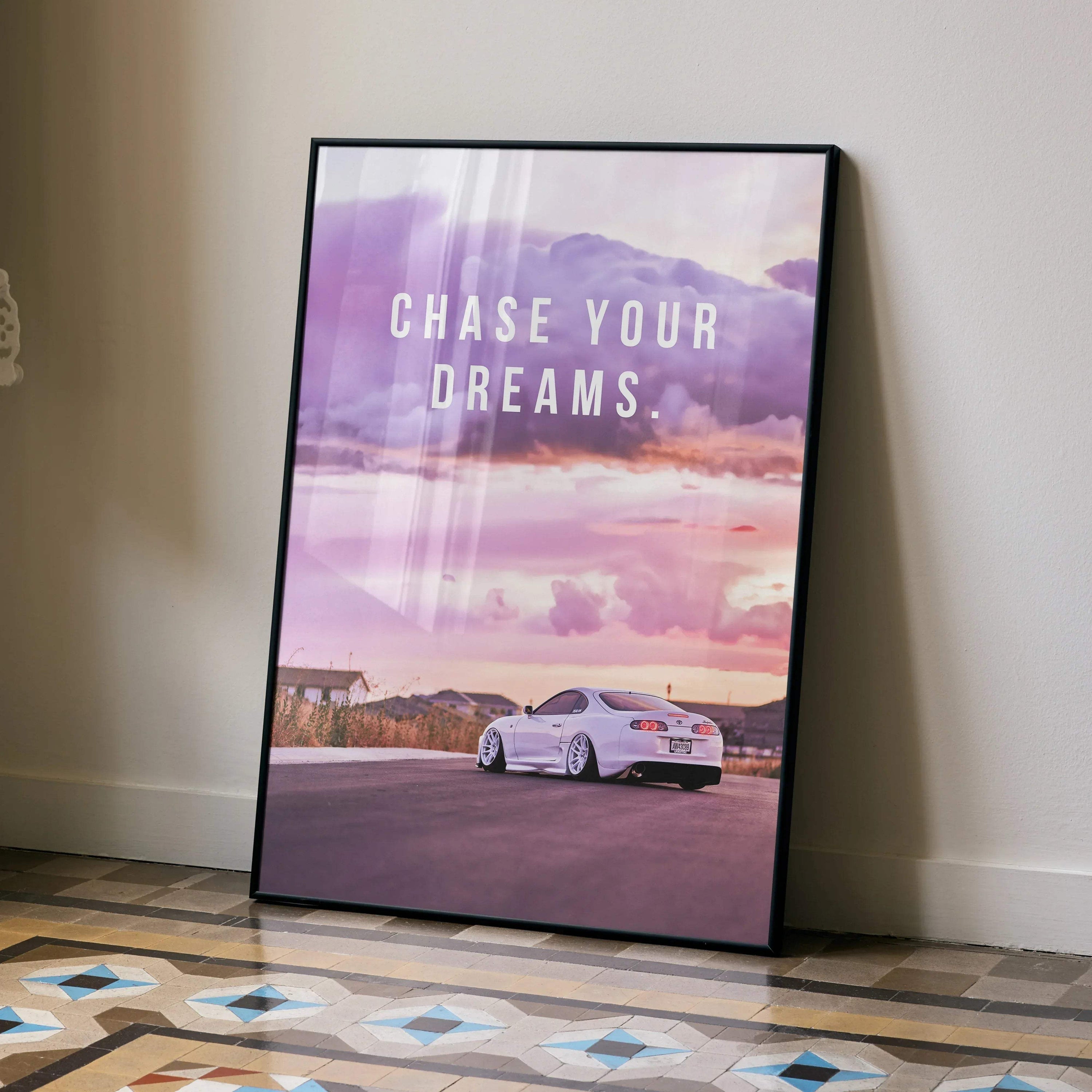 Motivational poster with Toyota Supra Mk4 under purple and pink sky, wall art with "Chase Your Dreams" text.