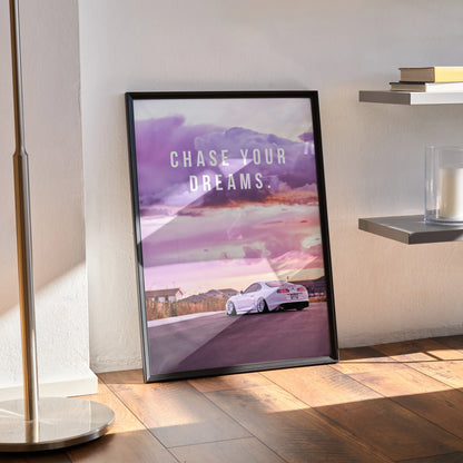 Motivational wall art poster featuring a white Toyota Supra Mk4 with purple sunset sky and "Chase Your Dreams" text.