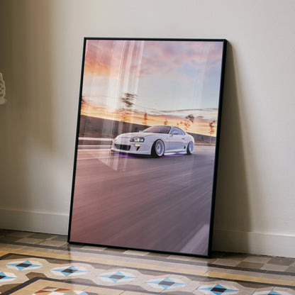 Toyota Supra MK4 poster with white sports car speeding on racetrack at sunset wall art.