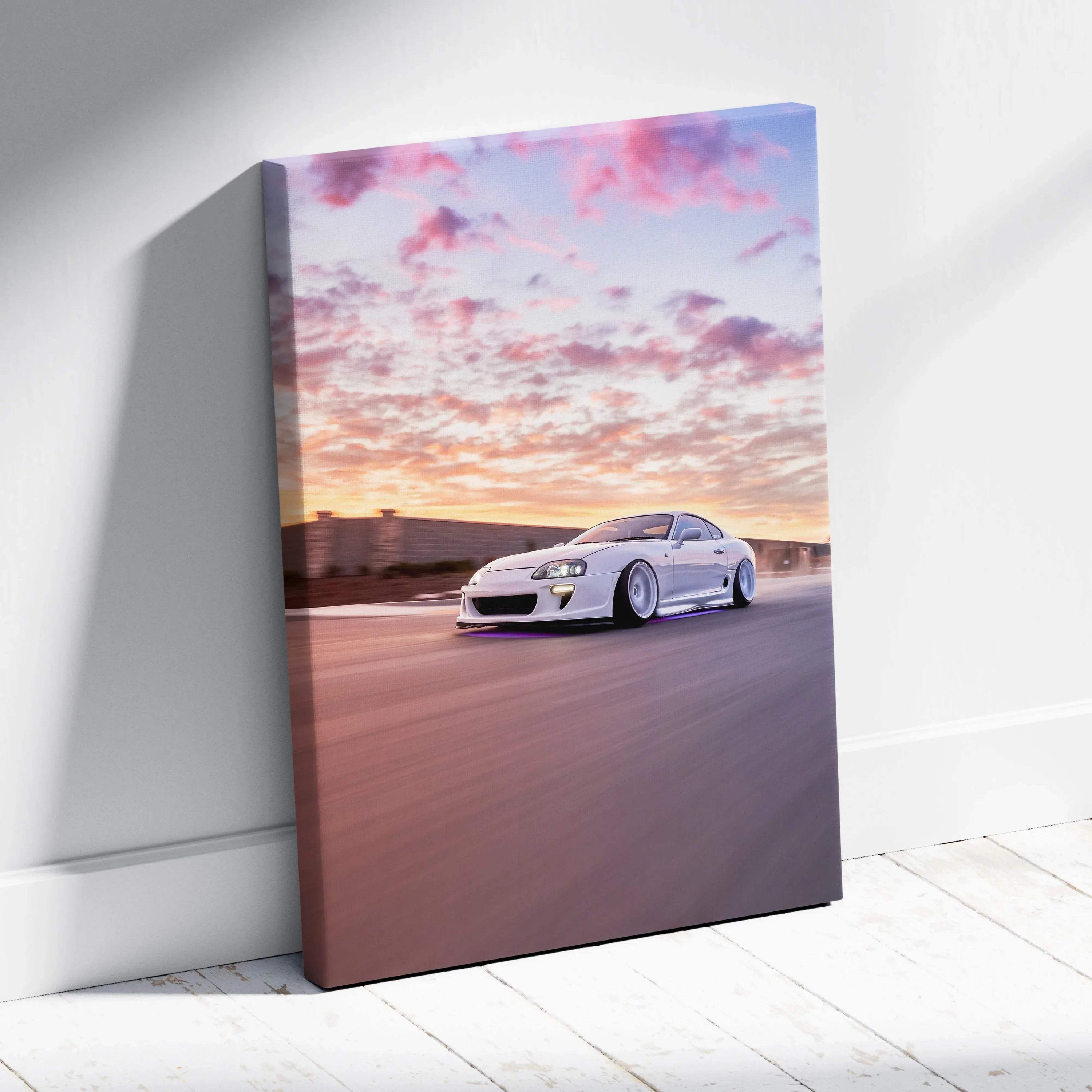 Toyota Supra MK4 driving at sunset with colorful sky on vertical canvas wall art.