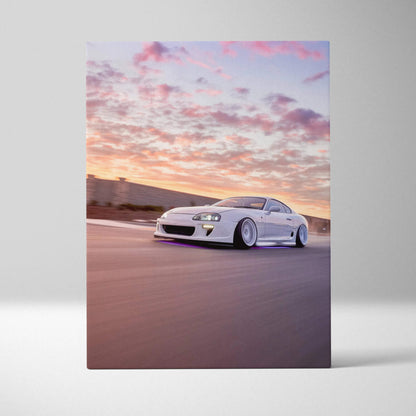 Toyota Supra MK4 driving at sunset with pink and orange sky, high-resolution canvas wall art.