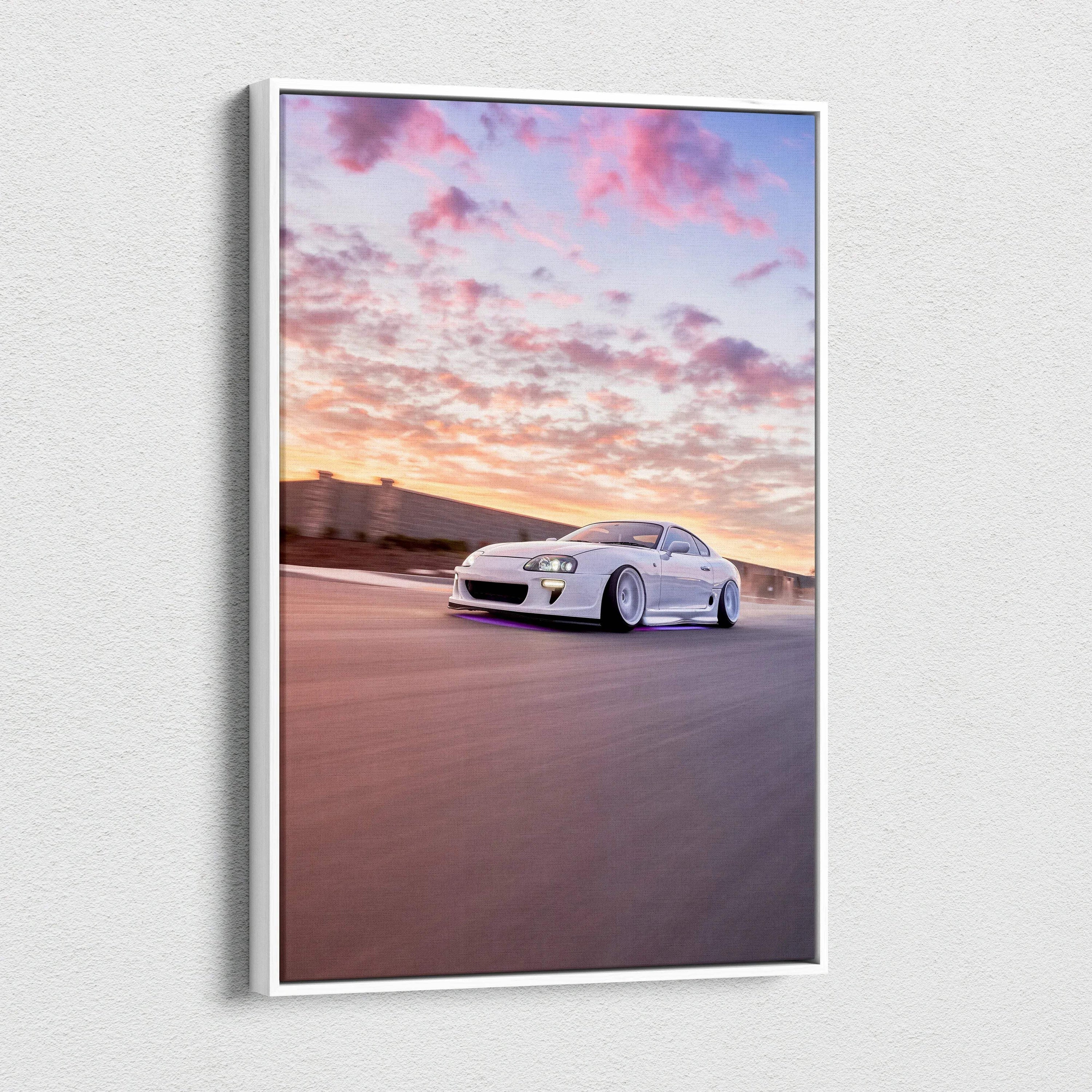 Toyota Supra MK4 speeding at sunset canvas wall art with vibrant sky and motion blur.