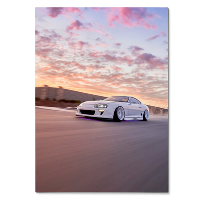 Toyota Supra MK4 speeding on road at sunset with vibrant colorful sky poster wall art.