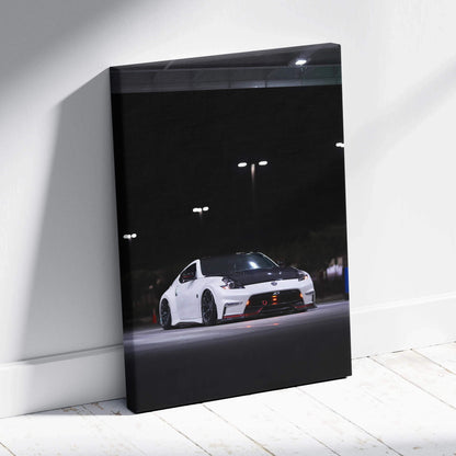 Nissan 370z white sports car at night on black canvas wall art with museum-quality print.