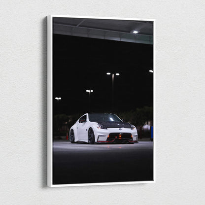Vertical canvas art of a white Nissan 370z car in a dark parking lot, modern wall art decor.
