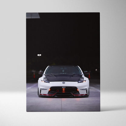 Nissan 370z front view on vertical canvas wall art with black background and red accents.