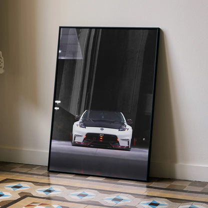 Nissan 370z front view poster with dark background and illuminated headlights wall art.