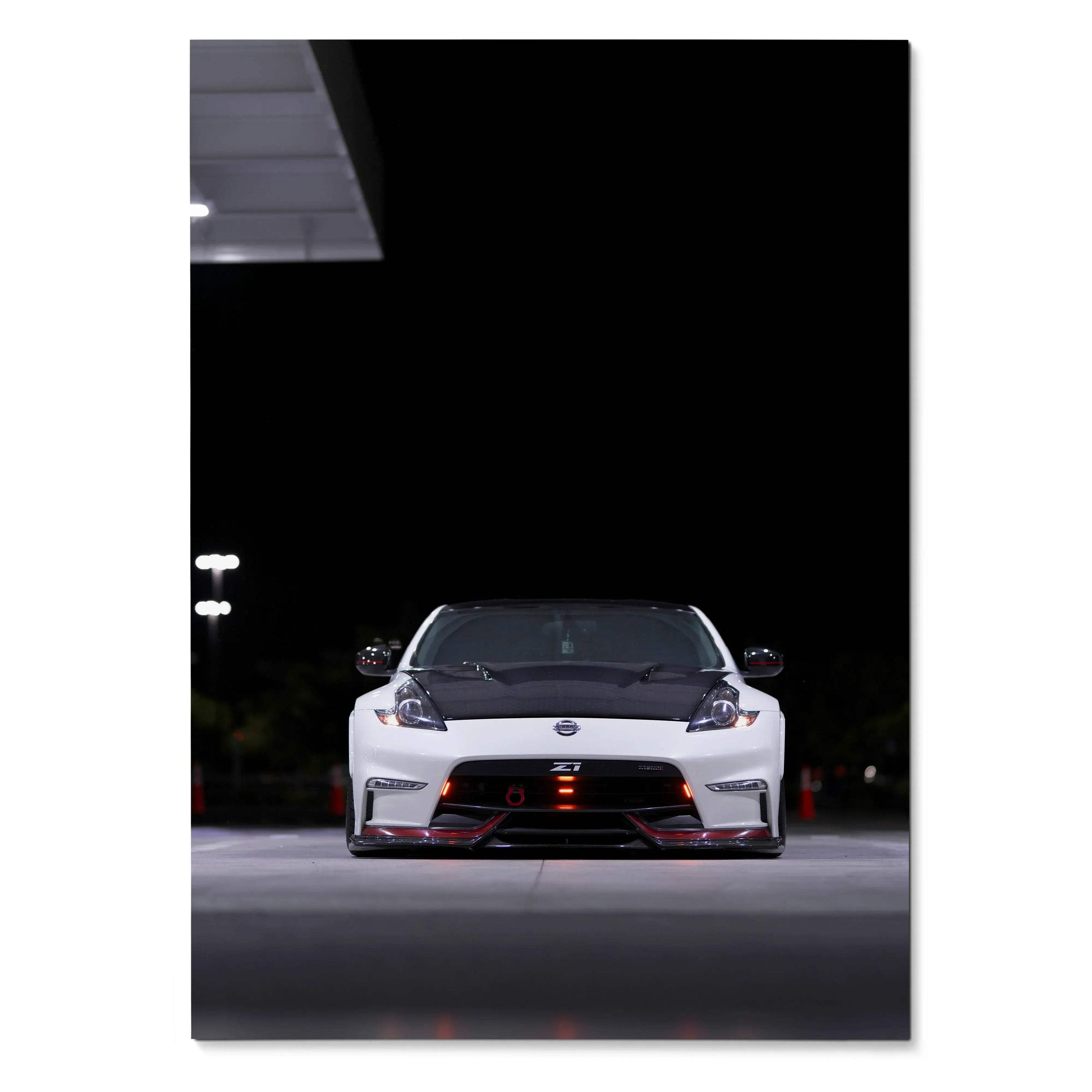 Nissan 370z front view poster with sleek white and black design, red accents on body, nighttime wall art.