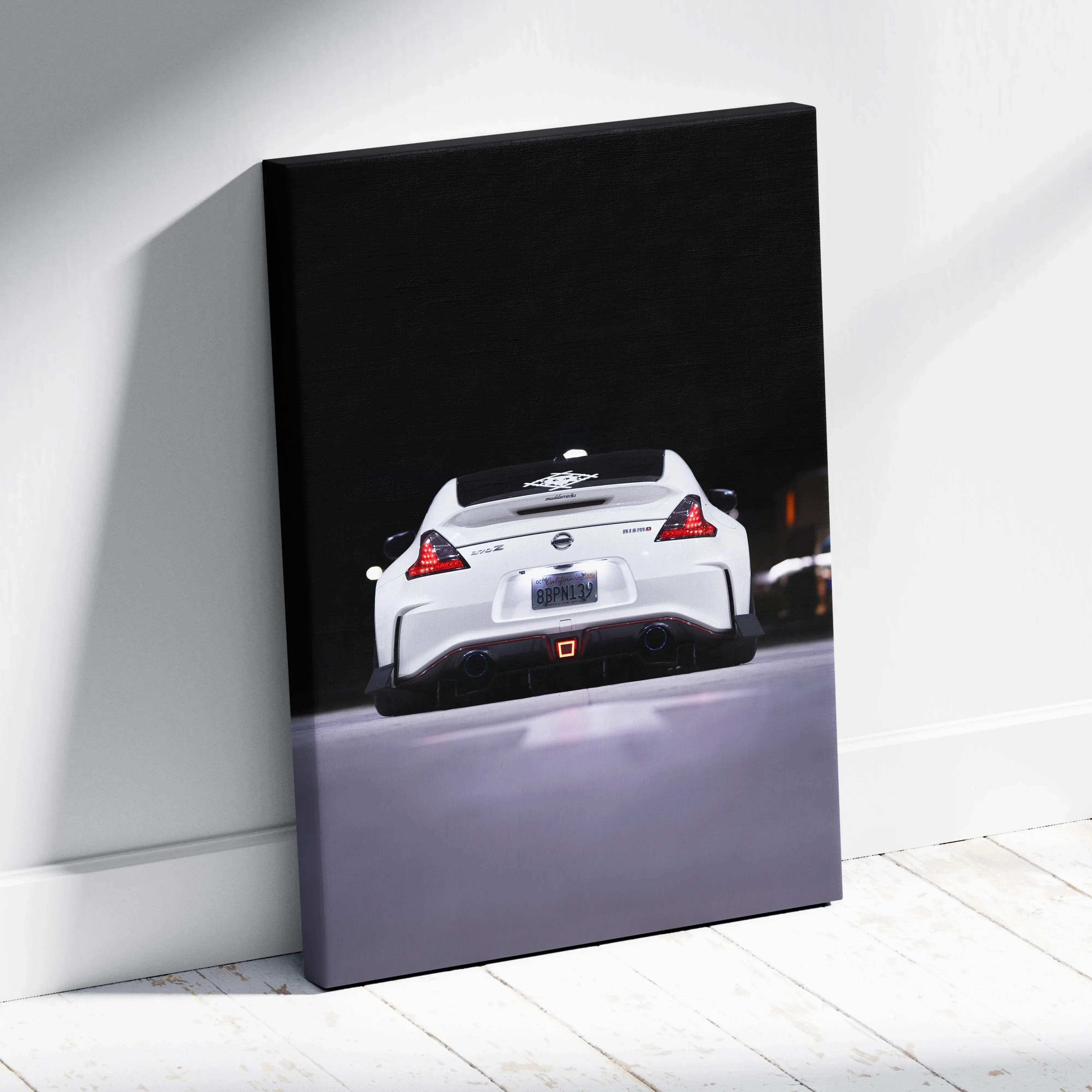 White nissan 370z sports car canvas wall art with red taillights on black background museum quality vertical print