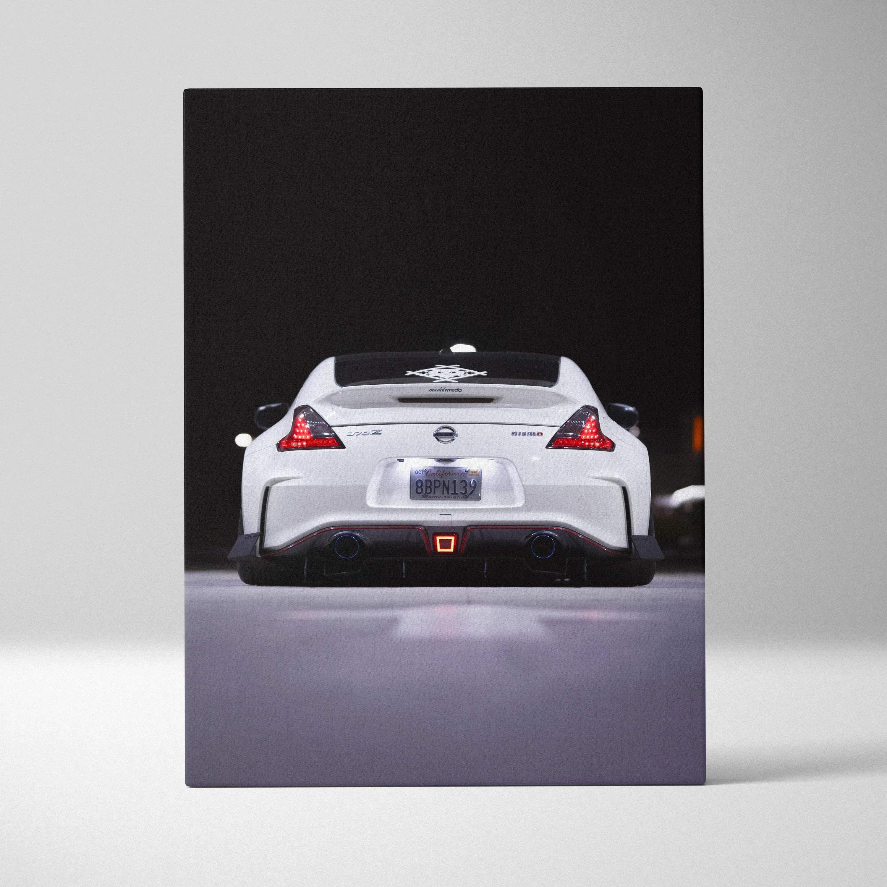 Nissan 370z rear view canvas wall art with high-resolution car photo on vertical canvas art panel.