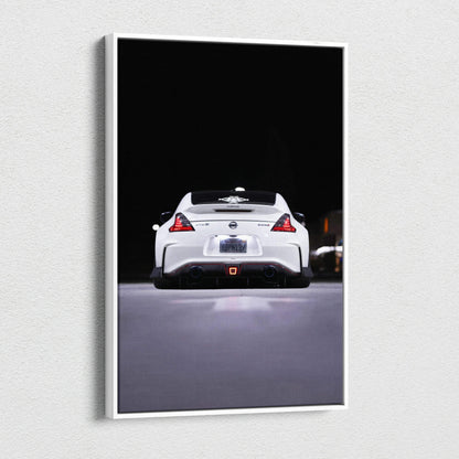 Vertical canvas art featuring a white Nissan 370z rear view against a black background, wall art print.