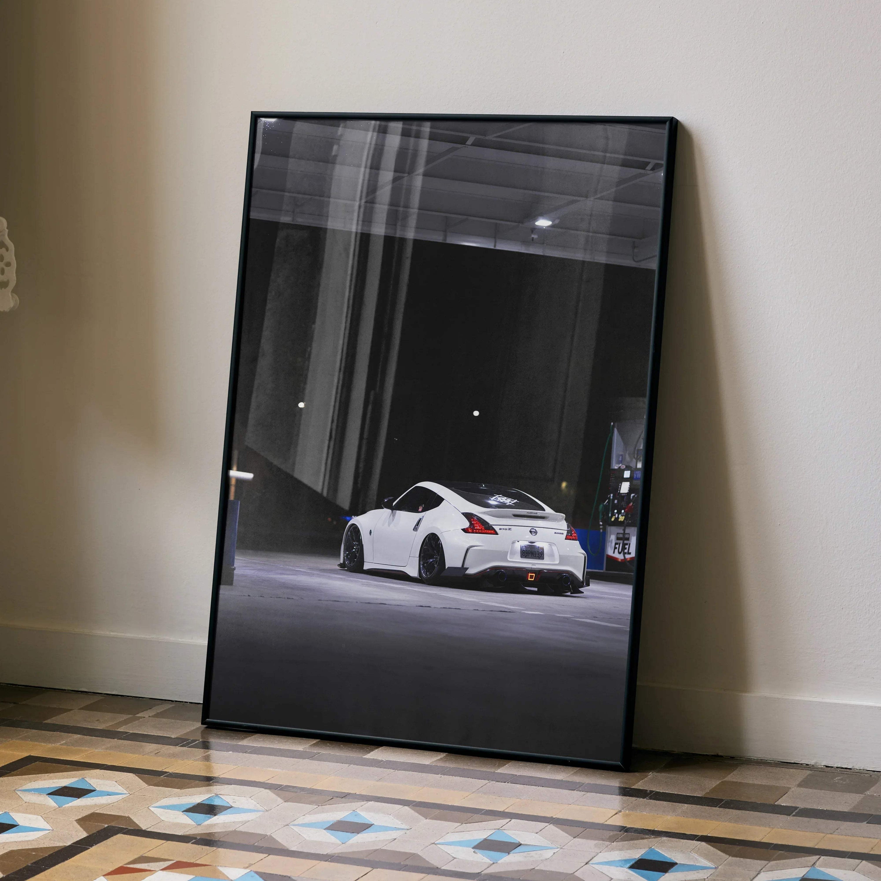 Nissan Z34 370z white sports car poster leaning against wall, modern automotive wall art.