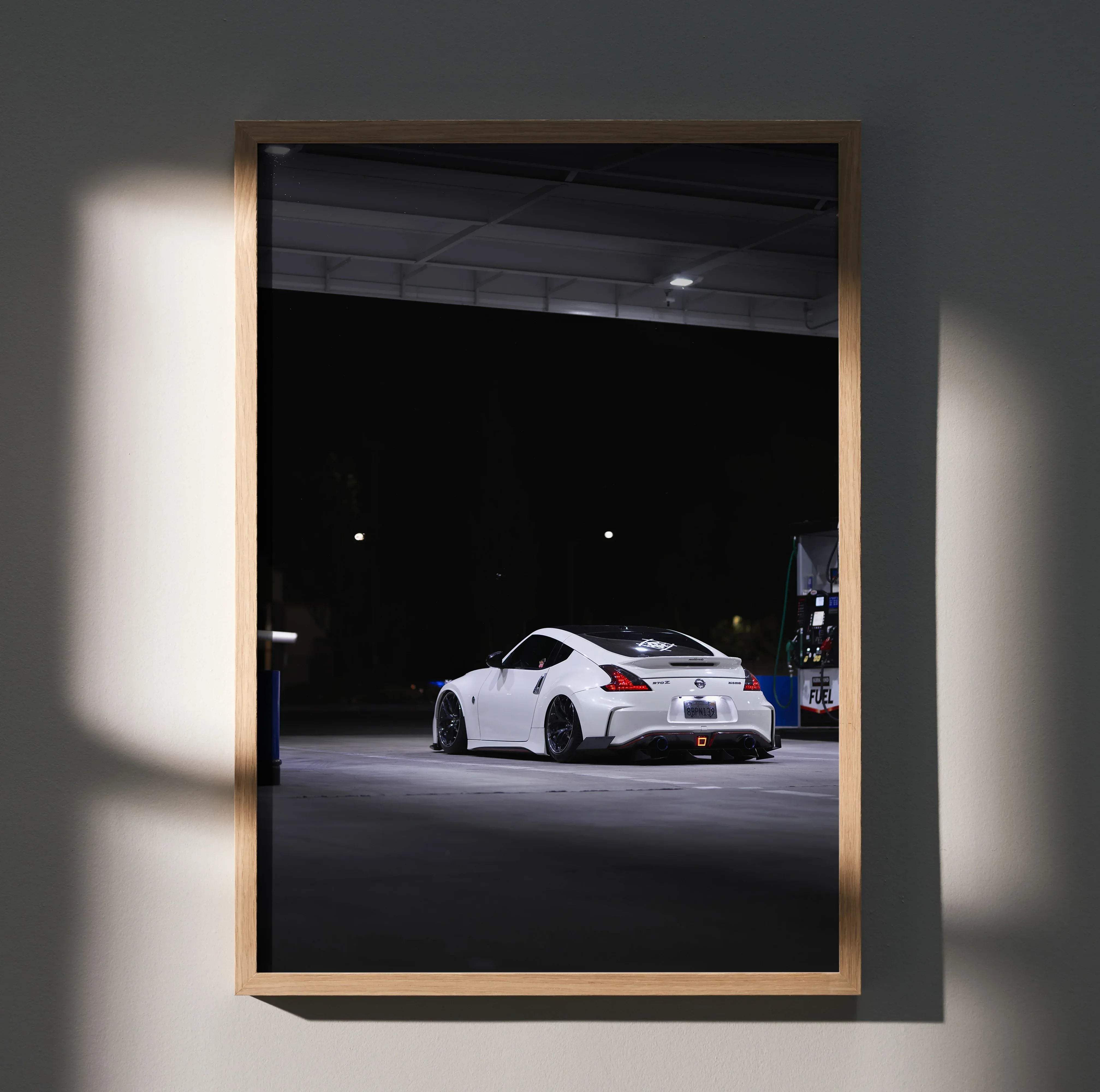 White Nissan 370z sports car in a framed high resolution automotive wall art print for car lovers