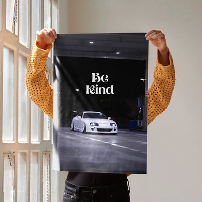 Toyota Supra Mk4 poster with "Be Kind" text and white sports car wall art.