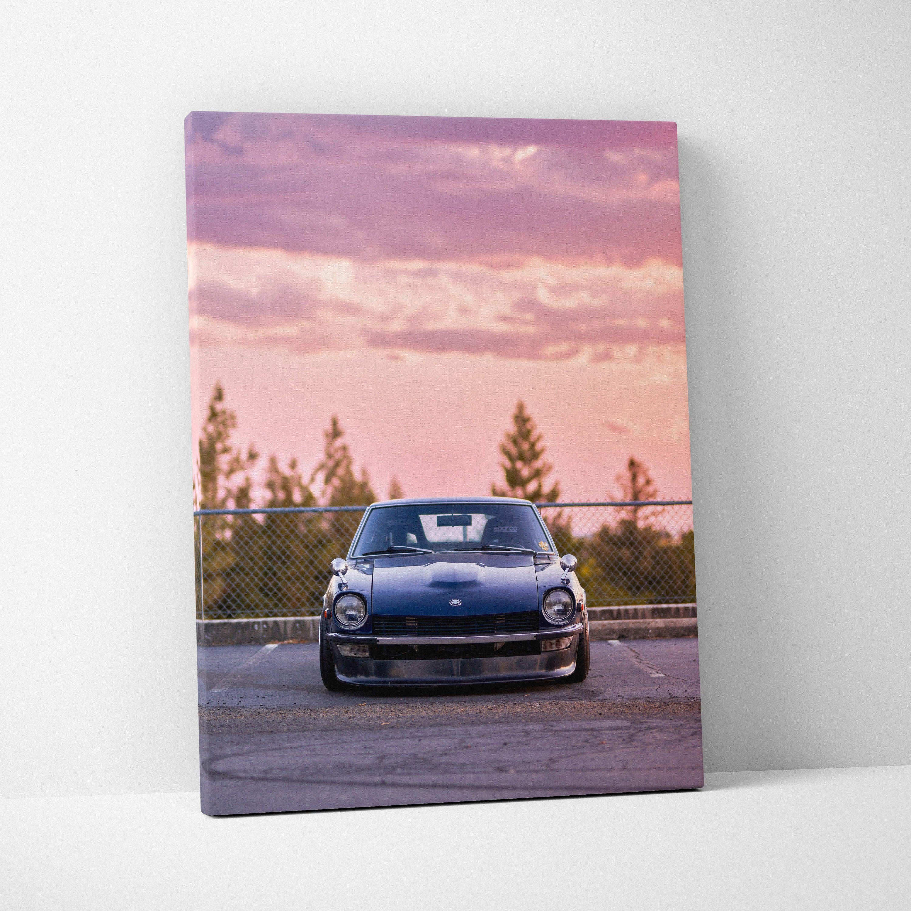 Nissan 240z canvas art with vintage car front view against pink sunset sky, vertical wall art.