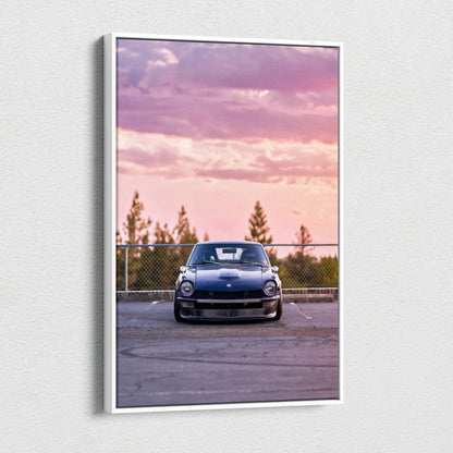 Vertical canvas art featuring a black Nissan 240z against a pink and purple sunset sky, wall art print.