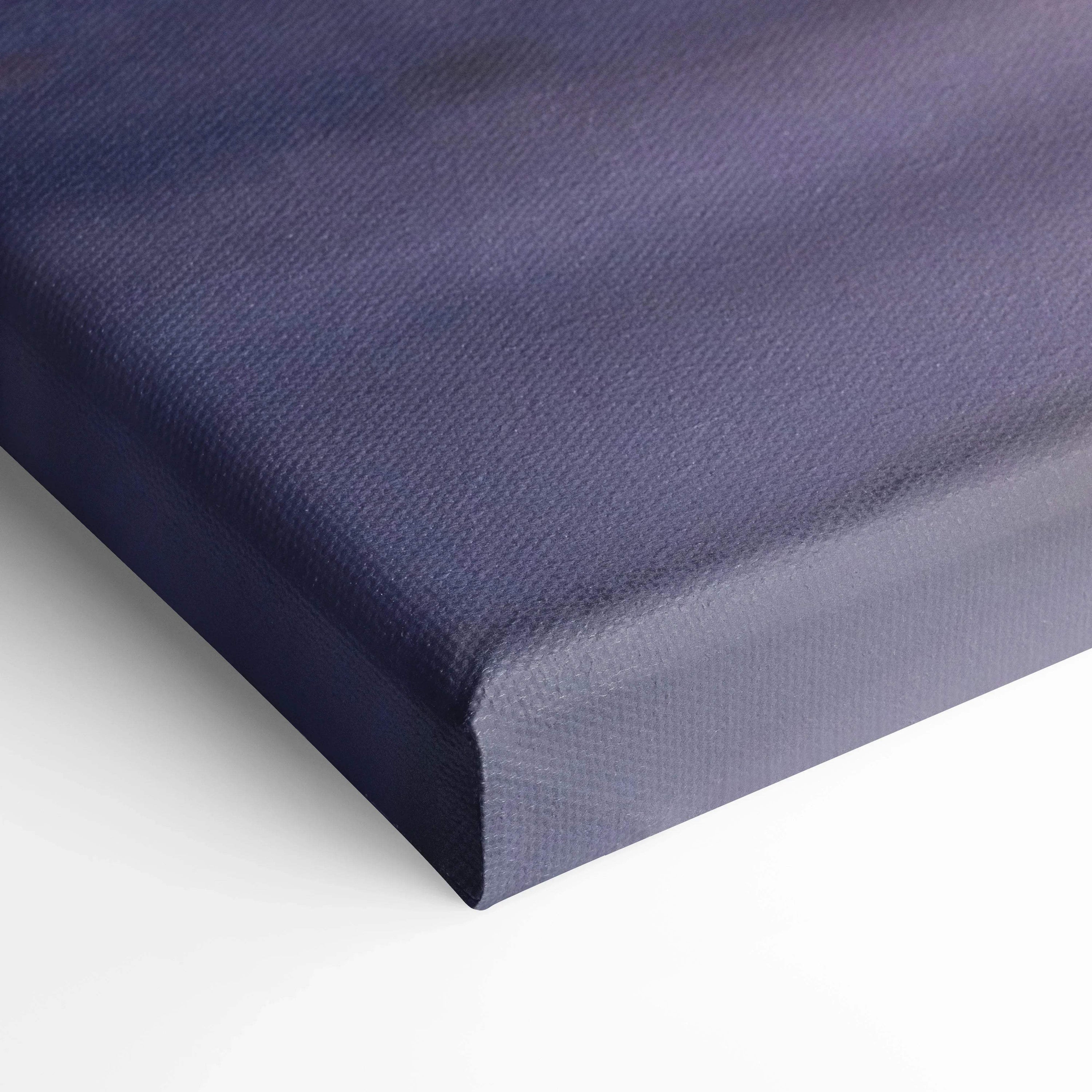 Close-up of blue textured canvas wrap with tight, clean edge for wall art display.