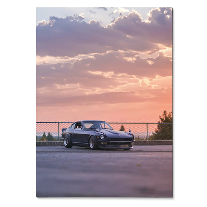Nissan 240z parked at sunset with vibrant sky in high-resolution poster wall art.
