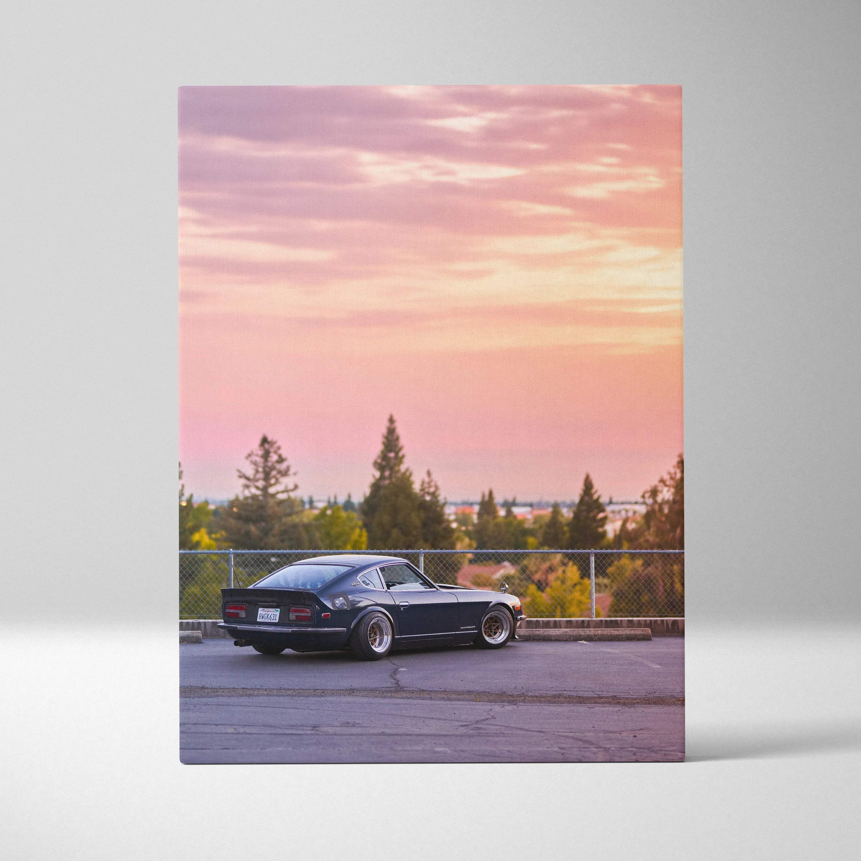 Nissan 240z parked at sunset with vibrant sky on vertical canvas art wall decor.