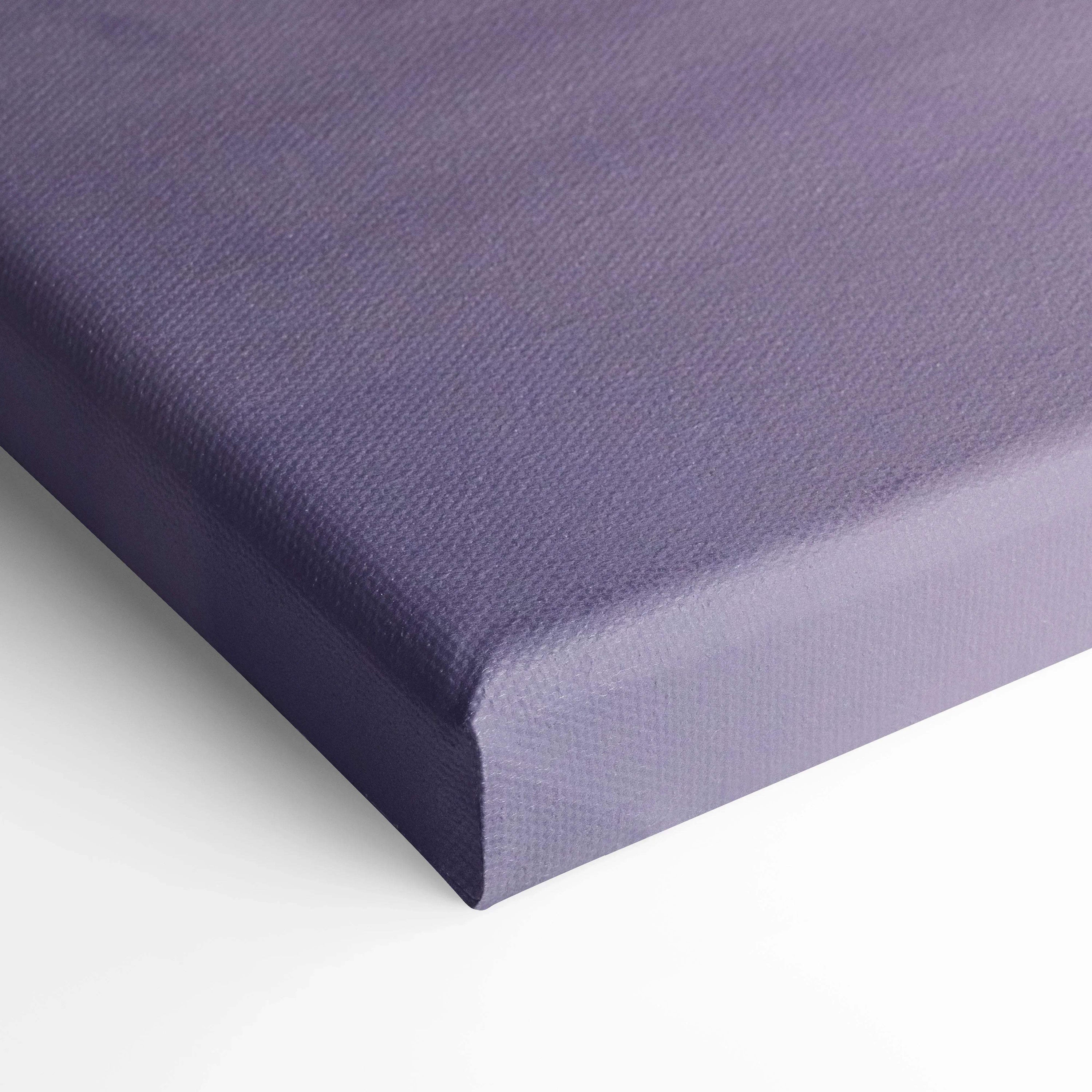 Purple textured canvas corner showing stretched fabric and frame edge, modern wall art detail.