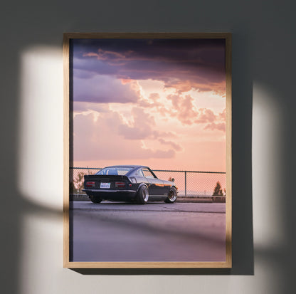 Nissan 240z parked at sunset with dramatic clouds, vintage car wall art poster.