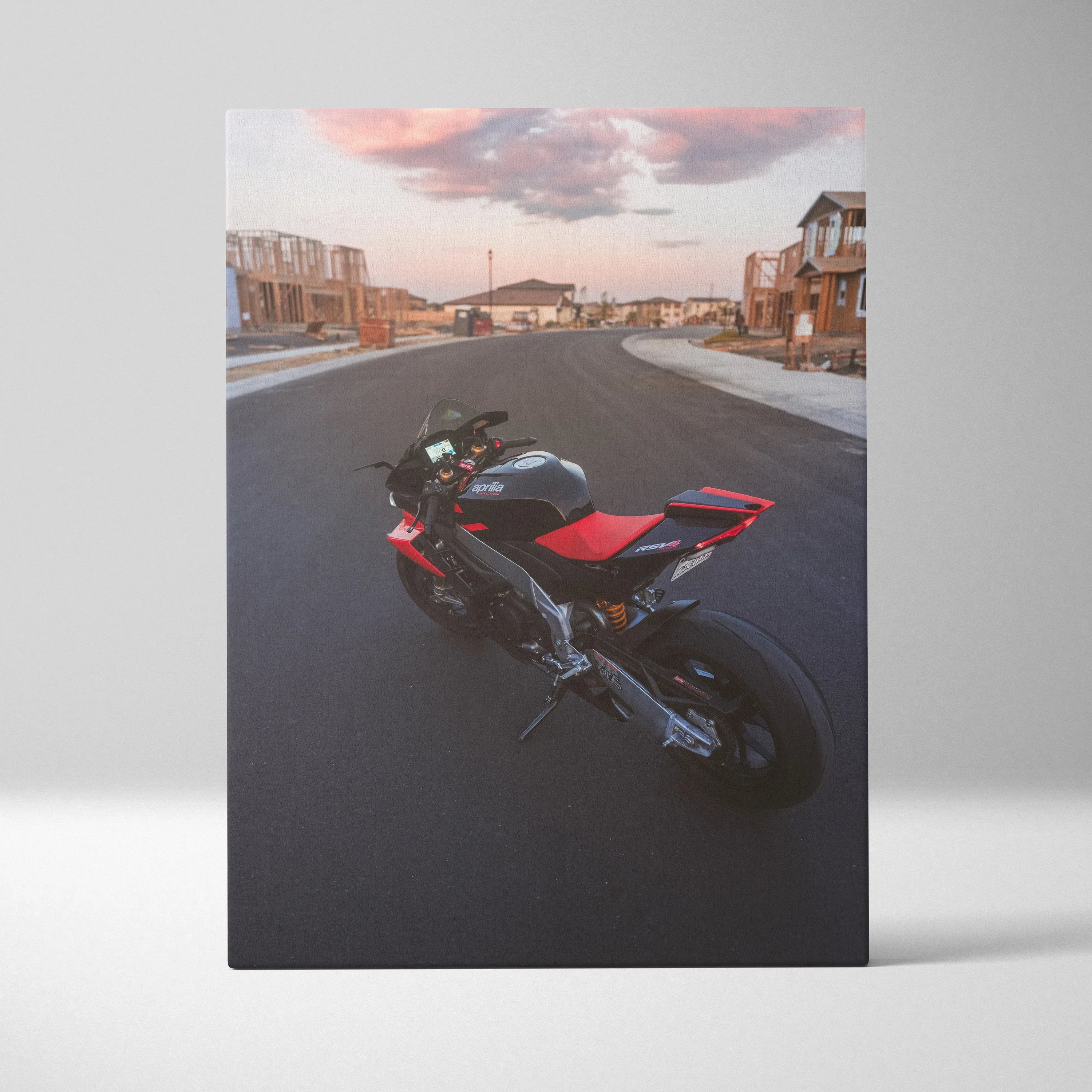 Vertical canvas wall art featuring Aprilia RSV4 1100 Factory sport motorcycle against suburban street background.