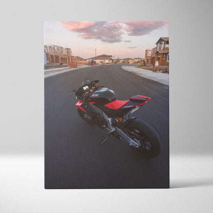 Vertical canvas wall art featuring Aprilia RSV4 1100 Factory sport motorcycle against suburban street background.