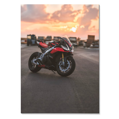 Aprilia RSV4 1100 Factory motorcycle poster with sunset background, wall art for enthusiasts.