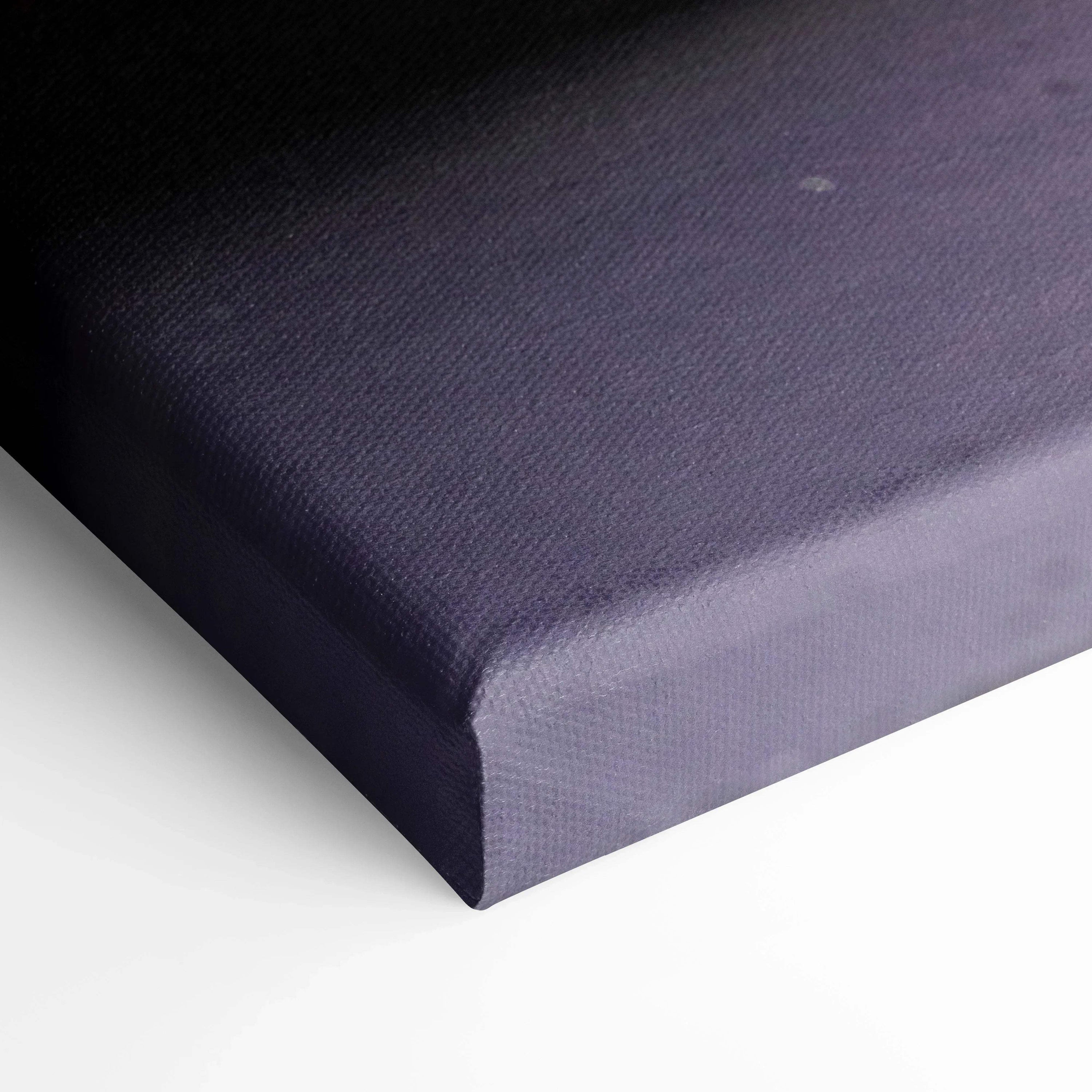 Dark purple stretched canvas corner showing texture and depth, gallery-wrapped wall art canvas.