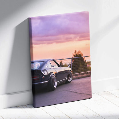 Nissan 240z classic car at sunset on vertical canvas wall art with purple and orange sky.