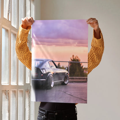 Nissan 240z car poster featuring classic black sports car with sunset sky background wall art.