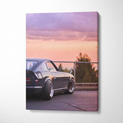 Nissan 240z rear view at sunset on vertical canvas wall art with soft purple and orange sky.