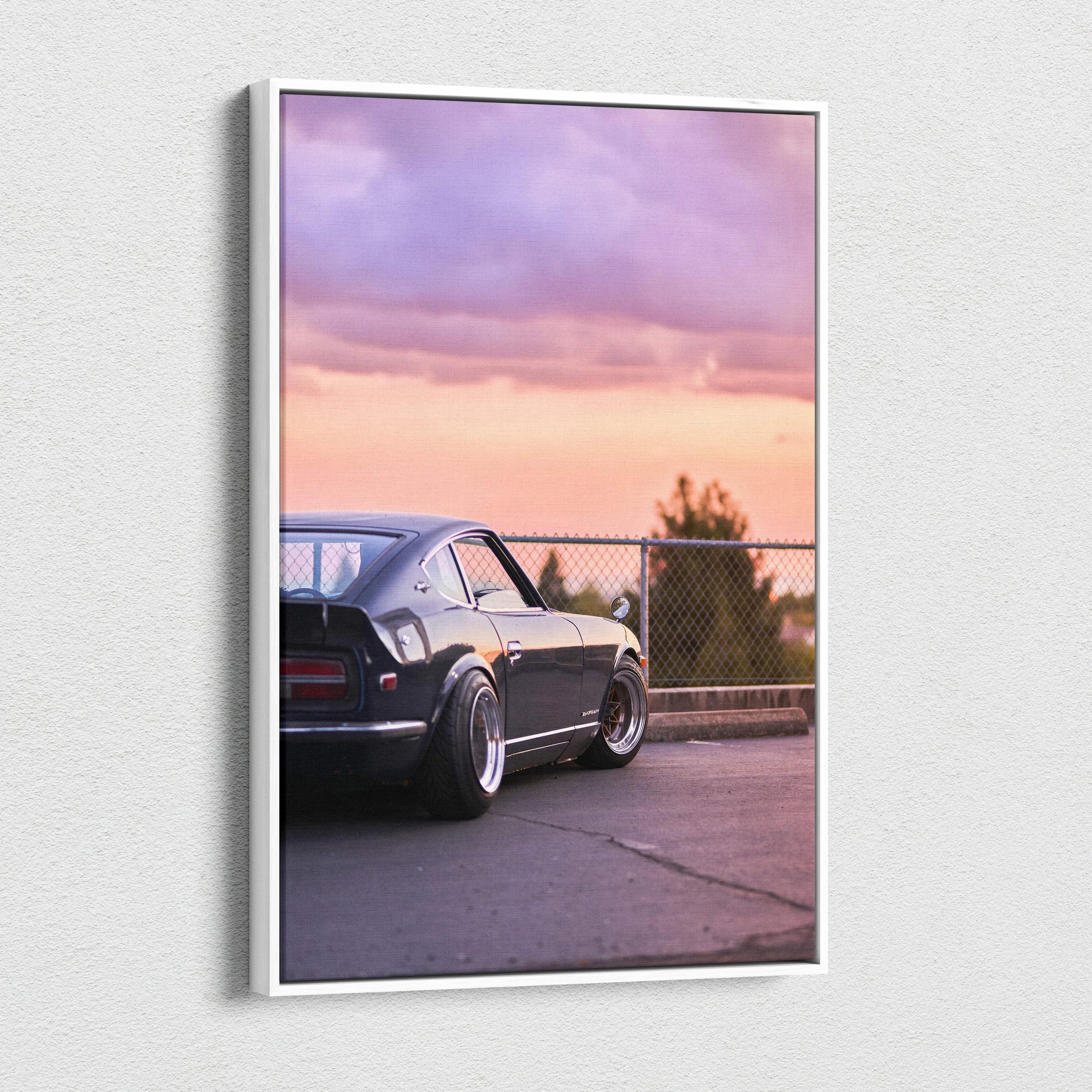 Nissan 240z car against sunset sky on vertical canvas wall art with modern white frame.
