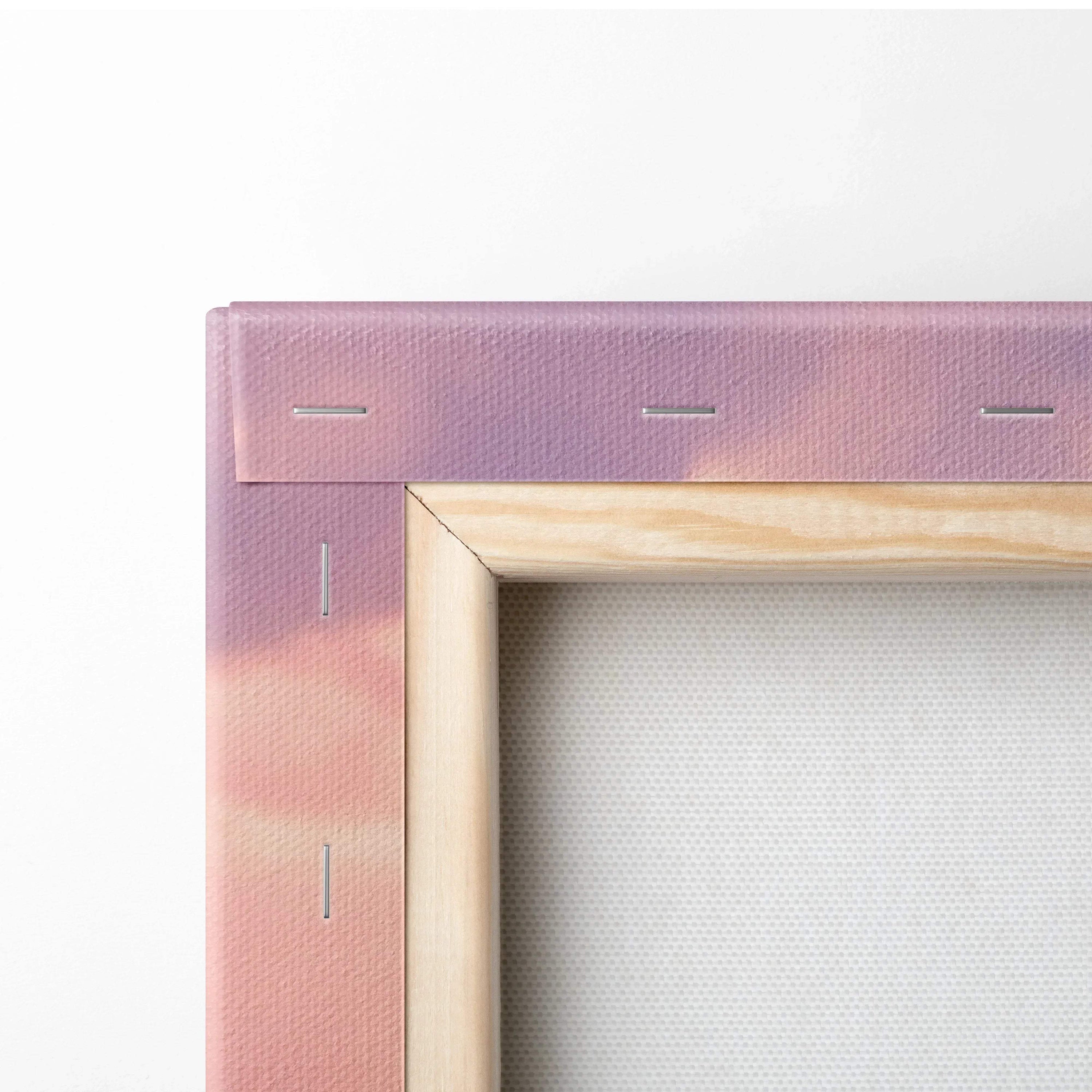 Close-up of wooden stretcher bar and purple-pink wrapped edge on canvas art wall print.