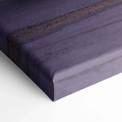 Close-up of textured canvas edge with dark purple and black tones, vertical wall art detail.