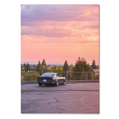 Nissan 240z parked at sunset with pink sky poster wall art.