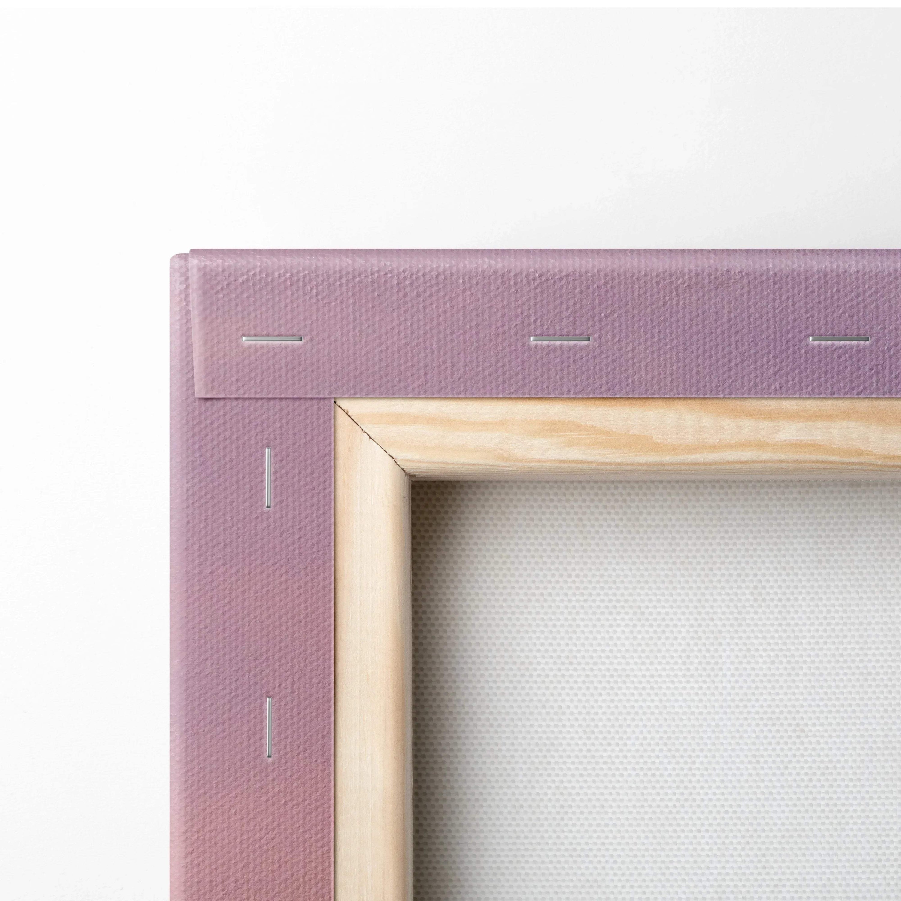 Close-up of wooden frame and stretched fabric on vertical canvas wall art with purple trim.