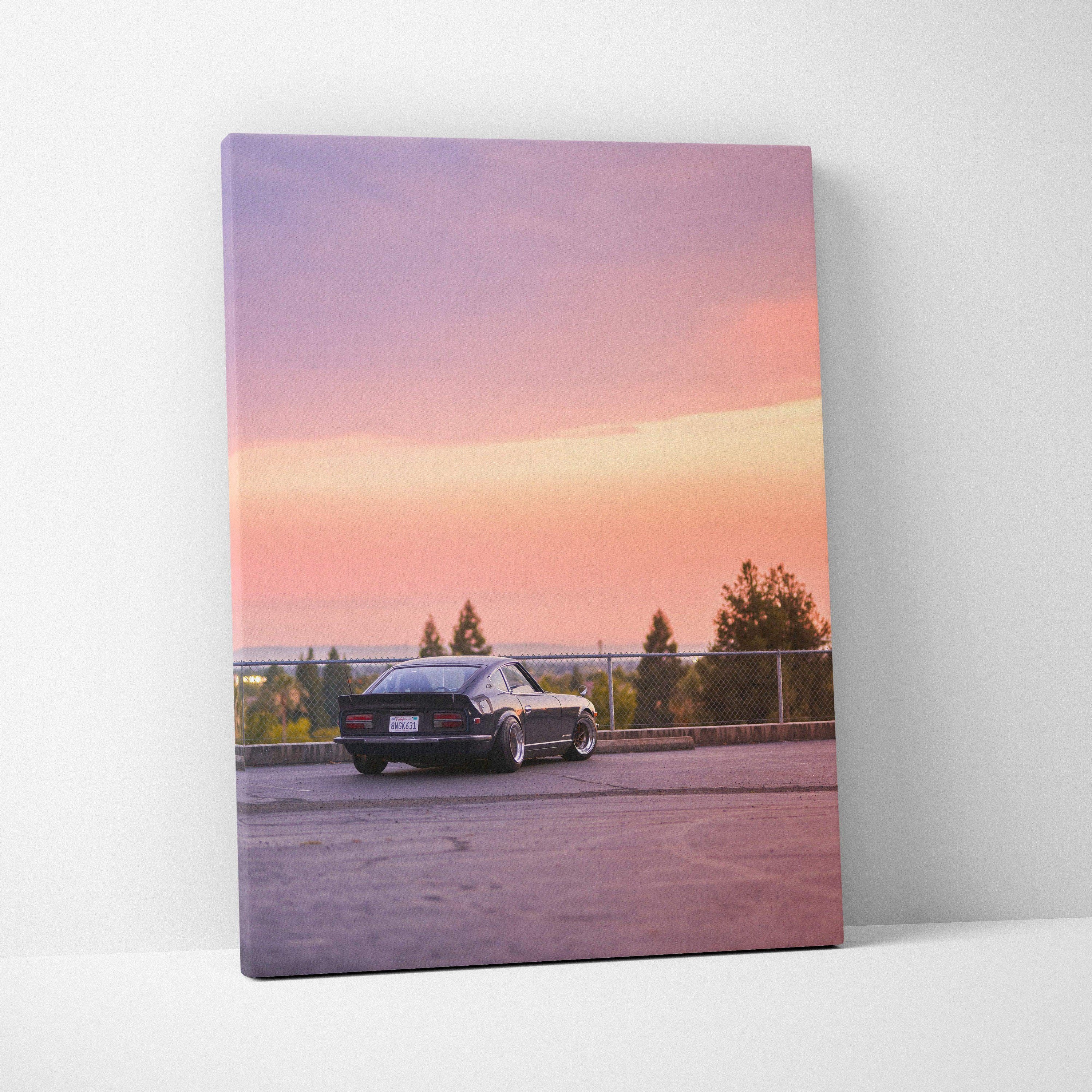 Nissan 240z parked at sunset with pink sky on vertical canvas wall art print.