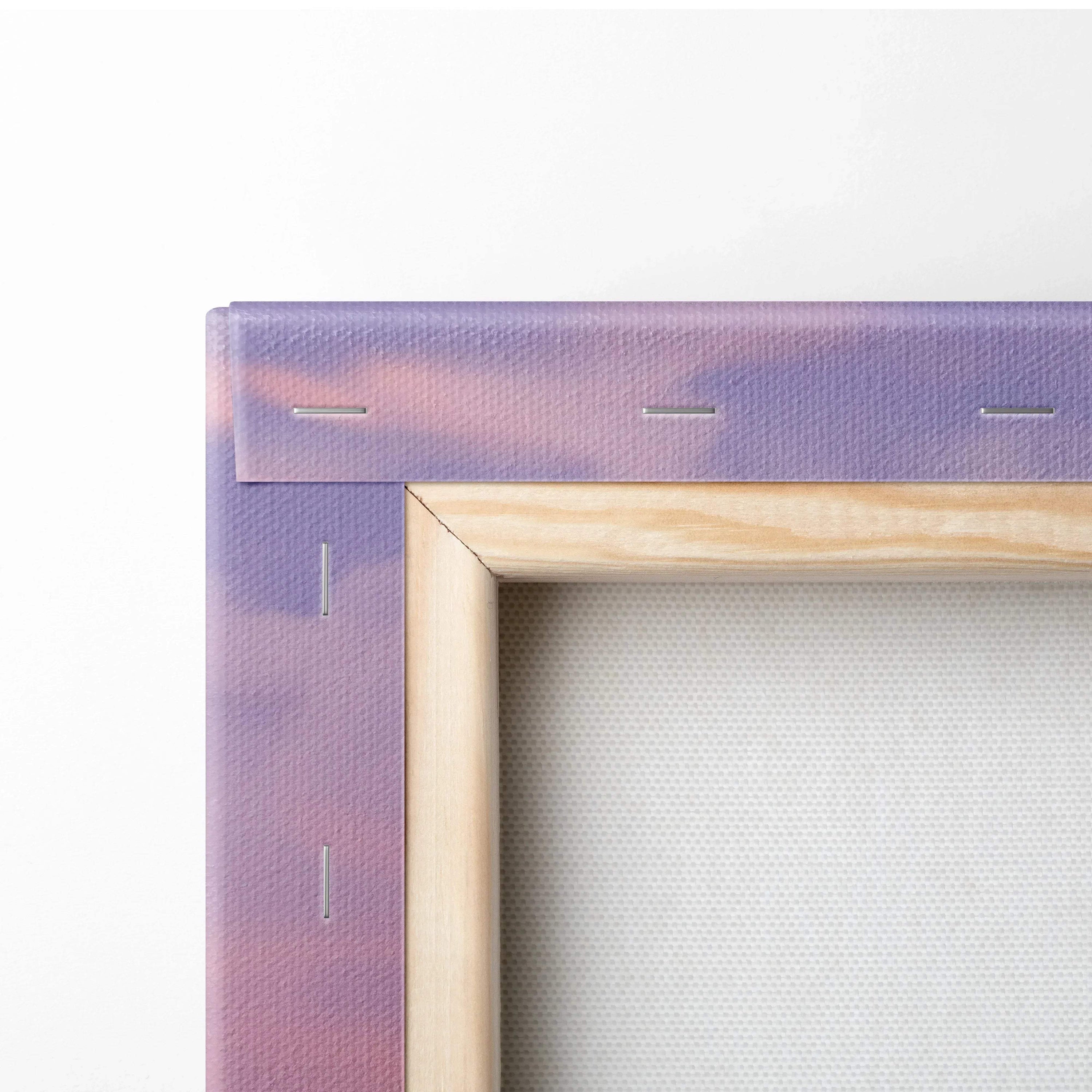 Close-up of unfinished wooden frame corner with purple-stained canvas stretched and stapled on back for wall art canvas print.