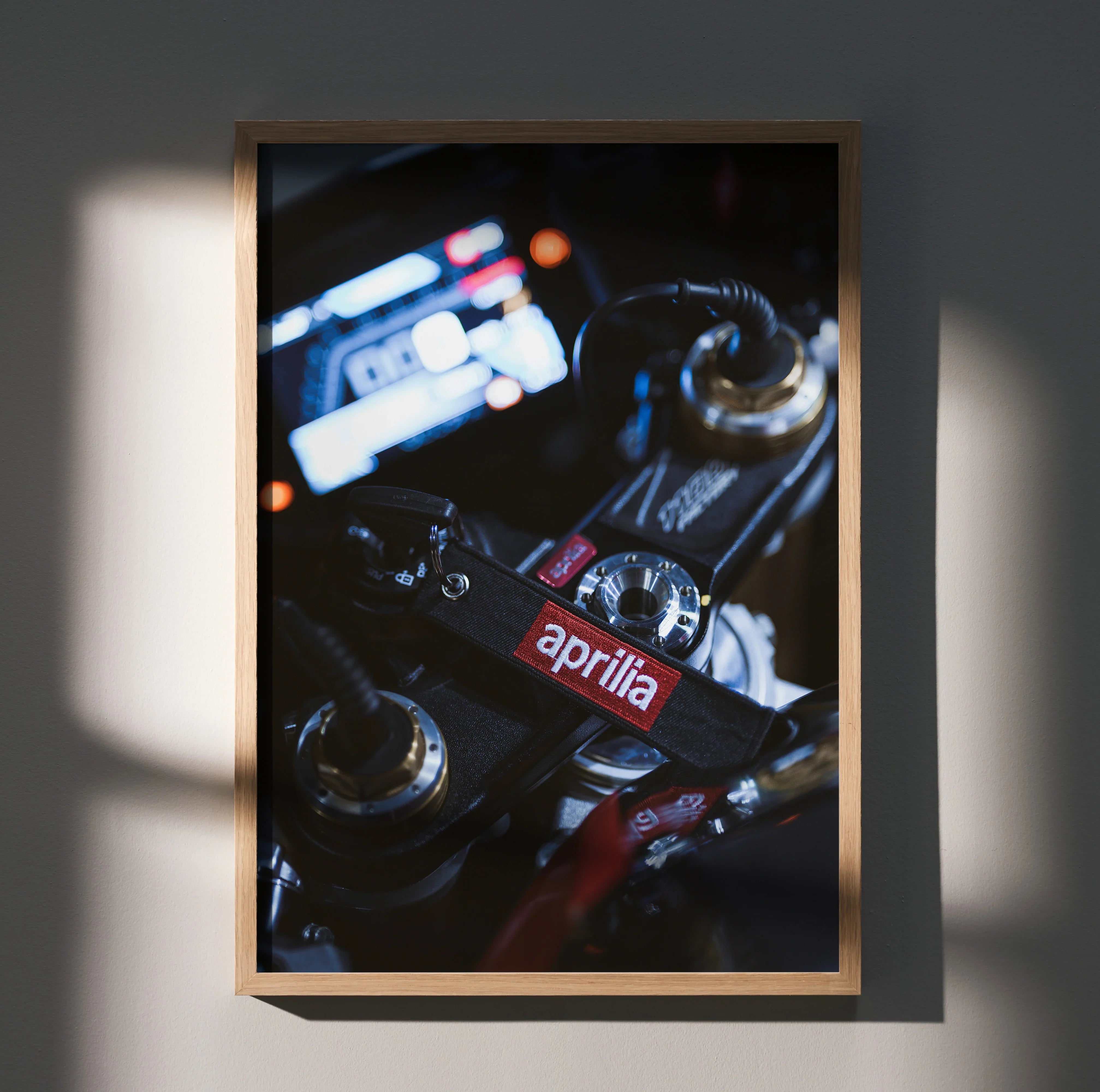 Aprilia RSV4 1100 Factory motorcycle dashboard close-up poster wall art in wooden frame.