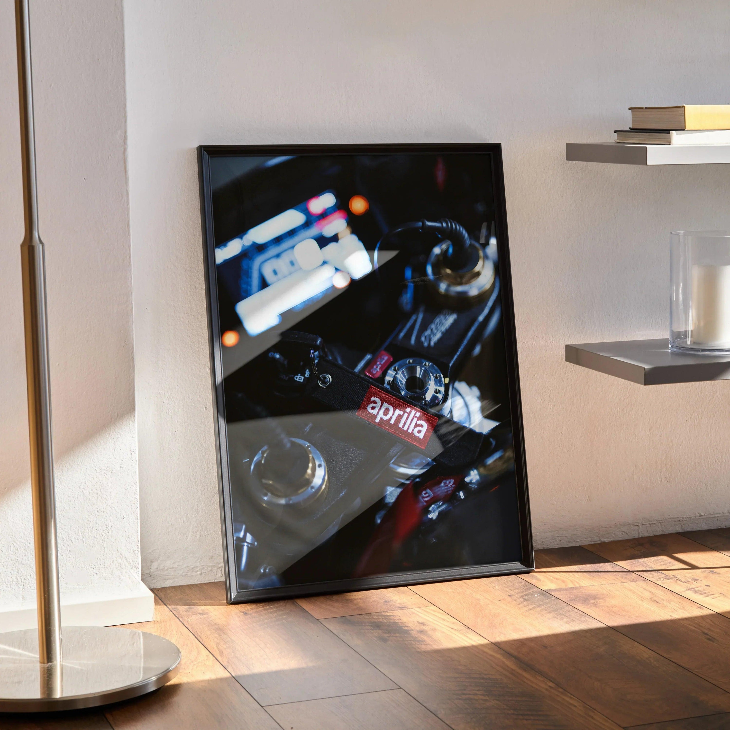 Aprilia RSV4 1100 Factory motorcycle close-up poster wall art with dark background in black frame.