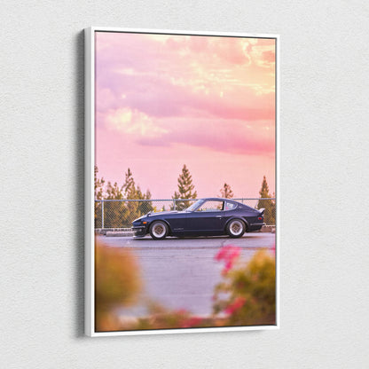 Vertical canvas wall art featuring a black Nissan 240z car against a pink sunset sky with trees in the background.