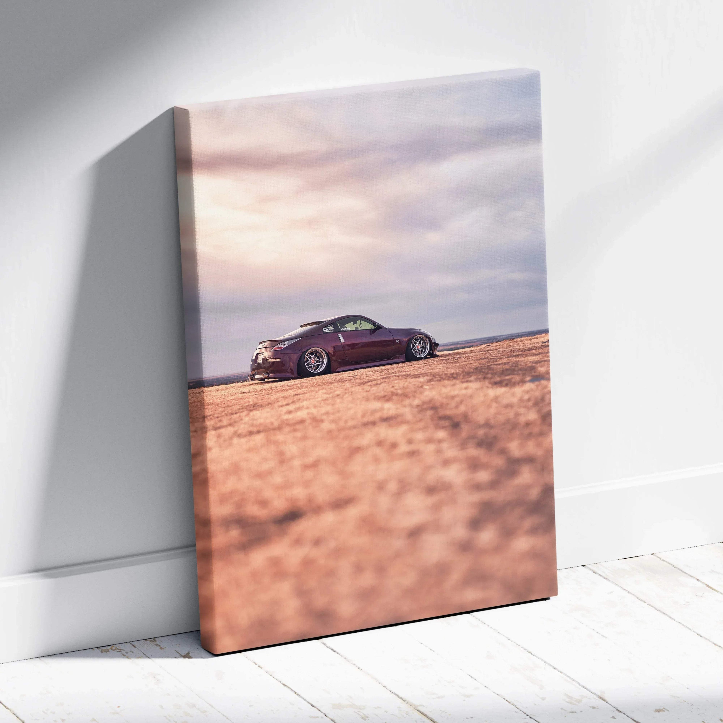 Nissan 350z sports car on desert road canvas wall art with soft sunset sky background.